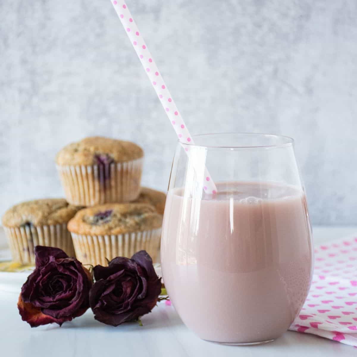 Pink beverage in a glass.