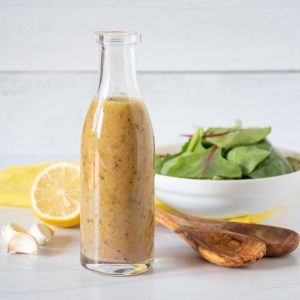 Glass bottle of salad dressing