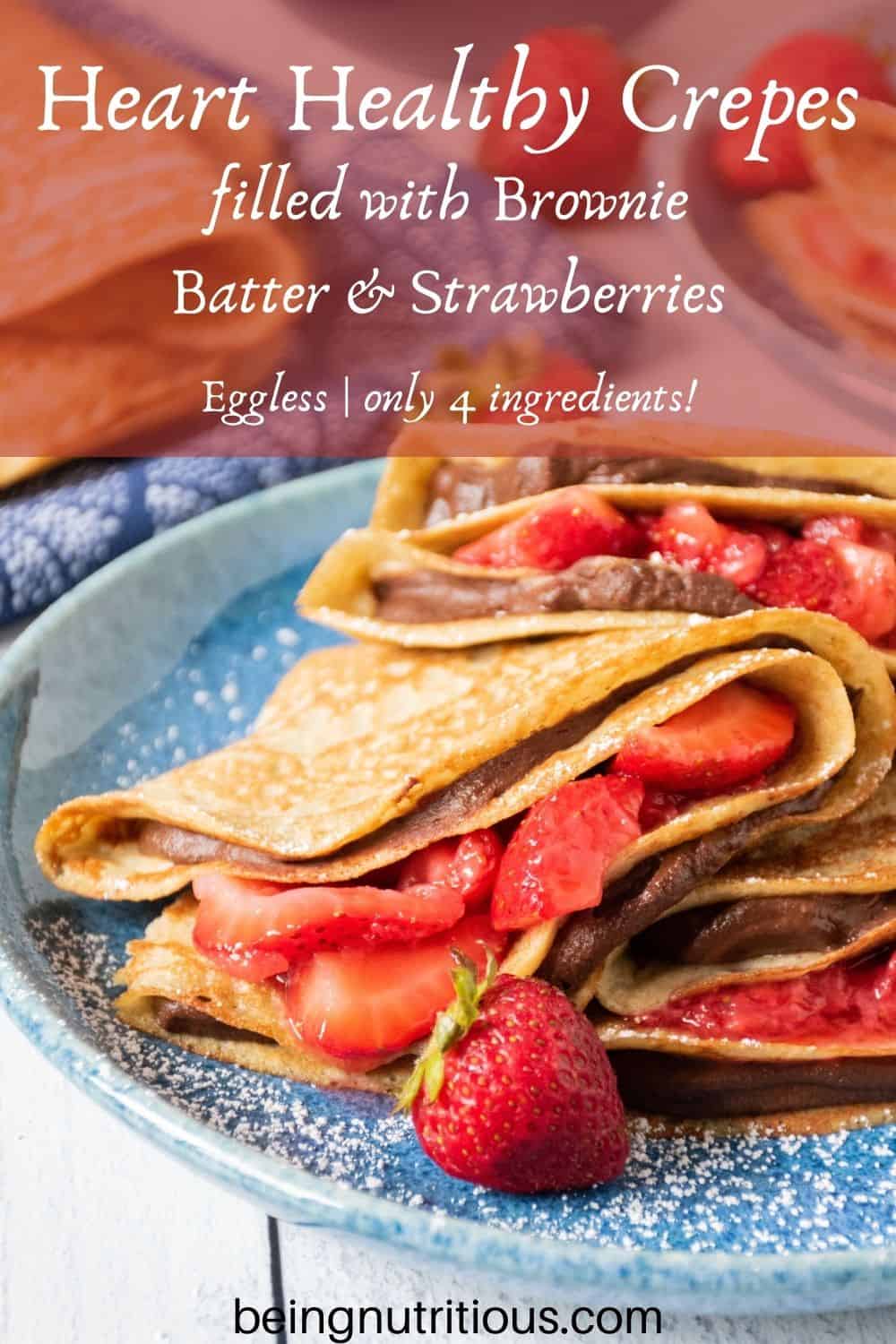 Plate of 3 crepes stuffed with chocolate dip and strawberries. Text overlay: Heart Healthy Crepes filled with Brownie Batter and strawberries; Eggless, only 4 ingredients!