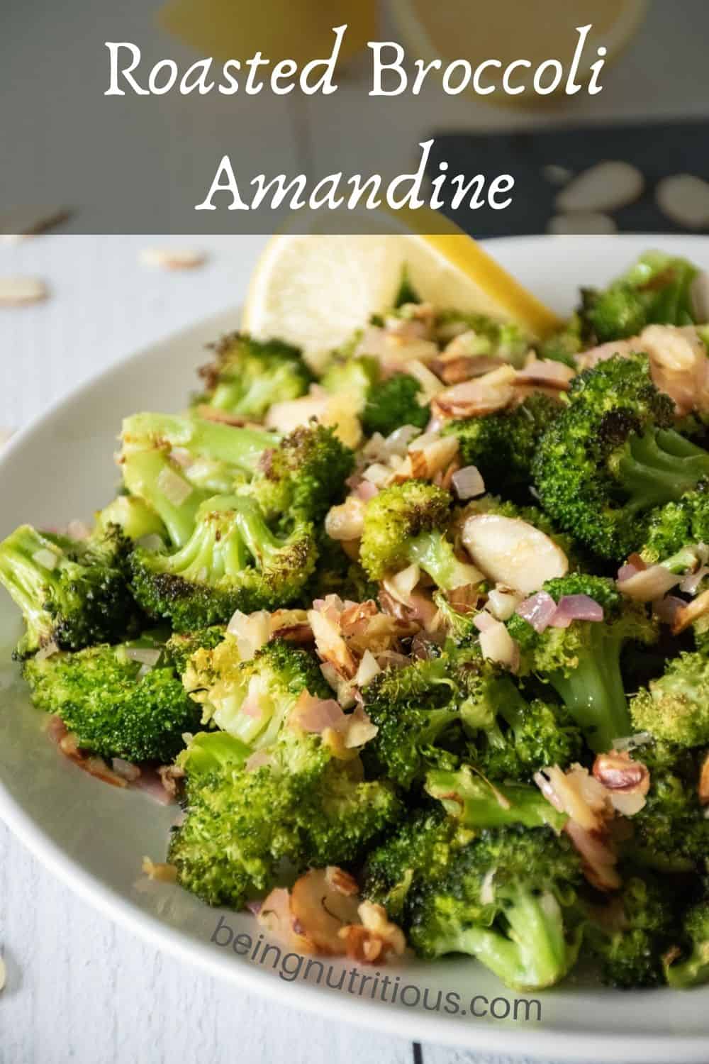 Plate of roasted broccoli with almond topping. Text overlay: Roasted Broccoli Amandine.