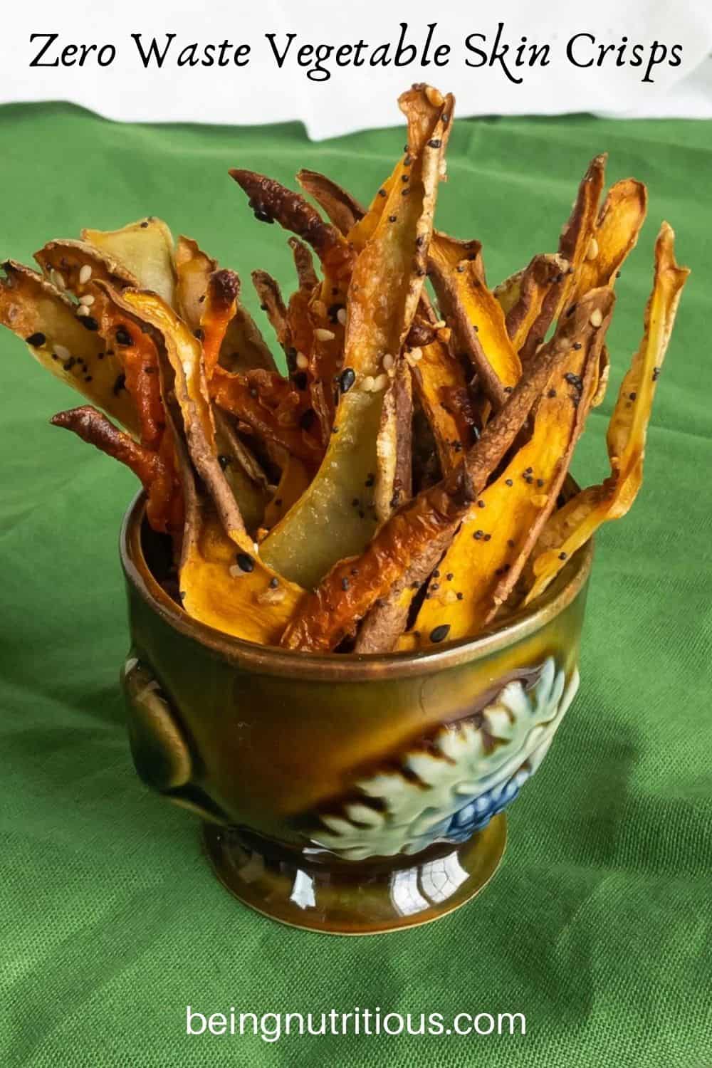 Veggie snacks in a small cup. Text overlay: Zero Waste Vegetable Skin Crisps.
