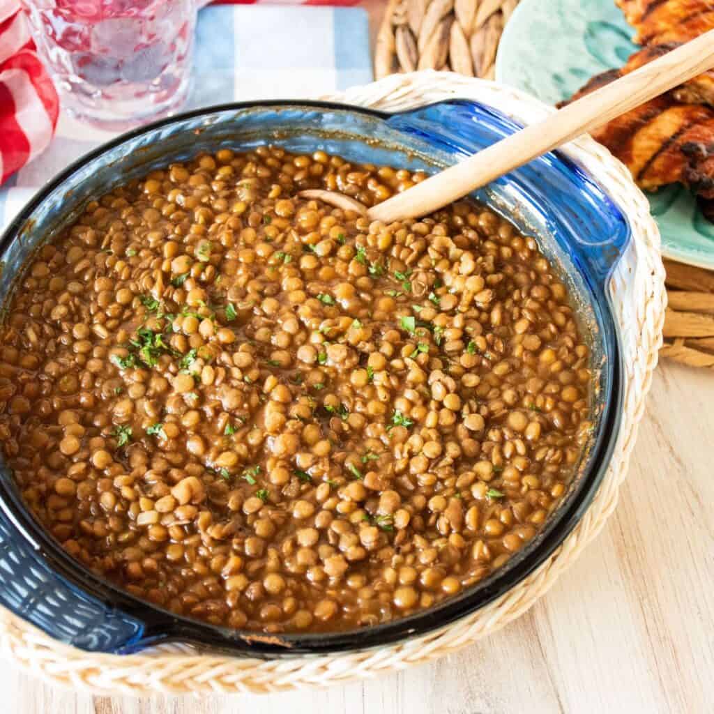 Casserole dish with baked beans in it.