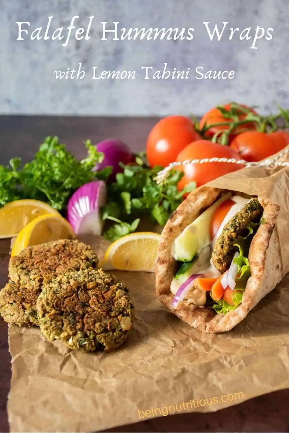 Falafel hummus wrap with baked falafel piled on the side. Text overlay: Falafel Hummus Wraps with Lemon Tahini Sauce.