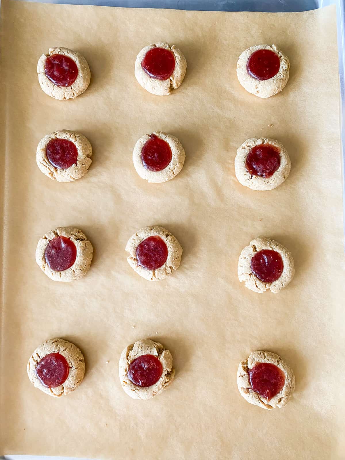 Baked cookies on a cookie sheet.