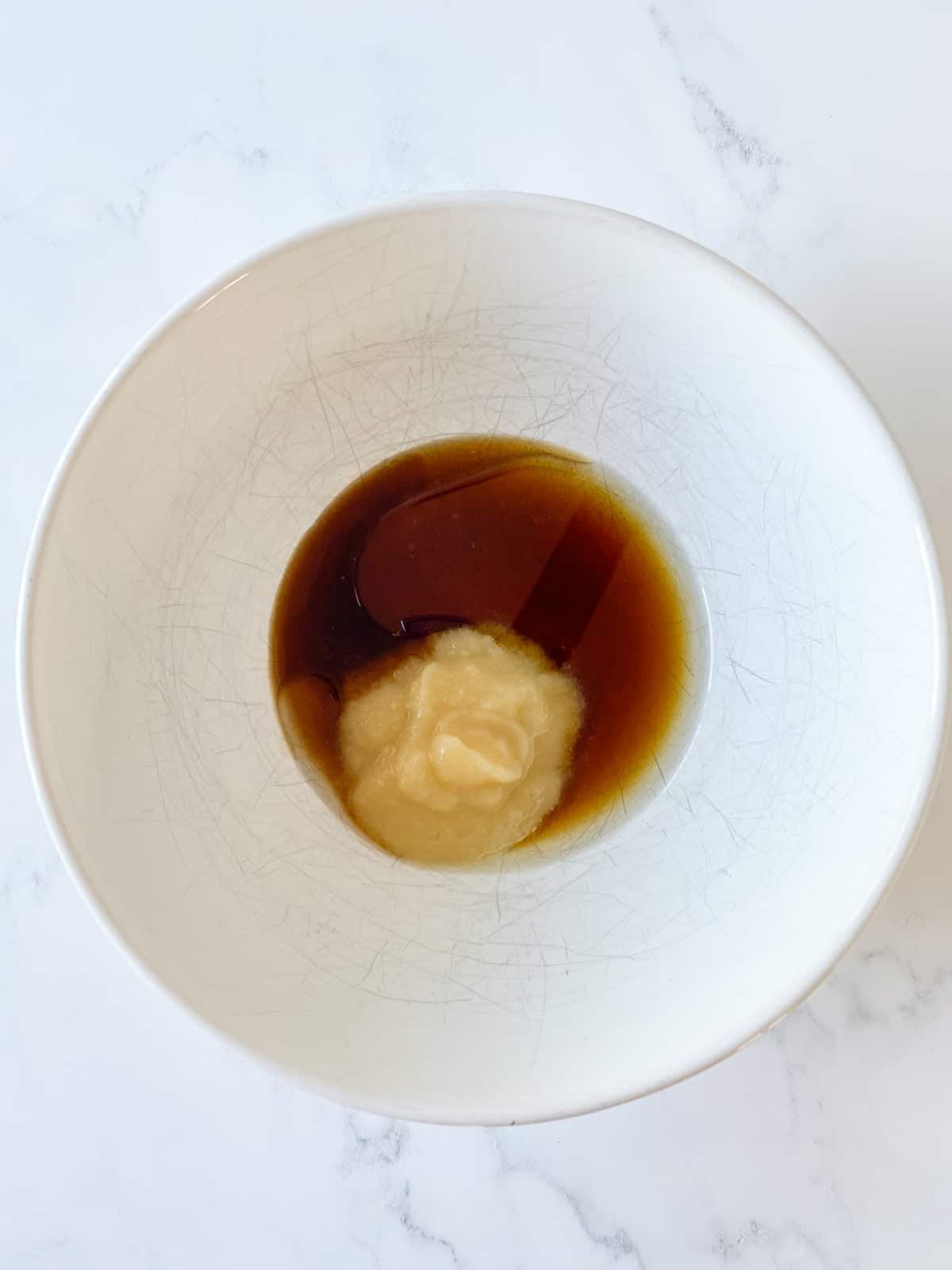 Wet cookie ingredients in a bowl.