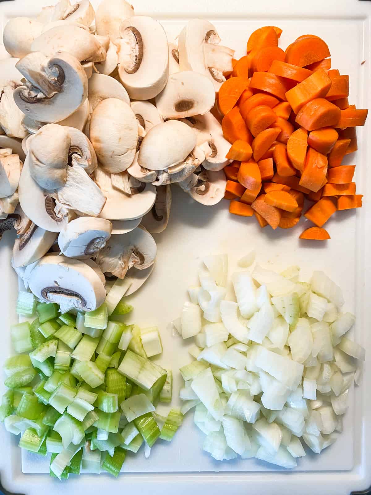 Chopped vegetables on a cutting board.
