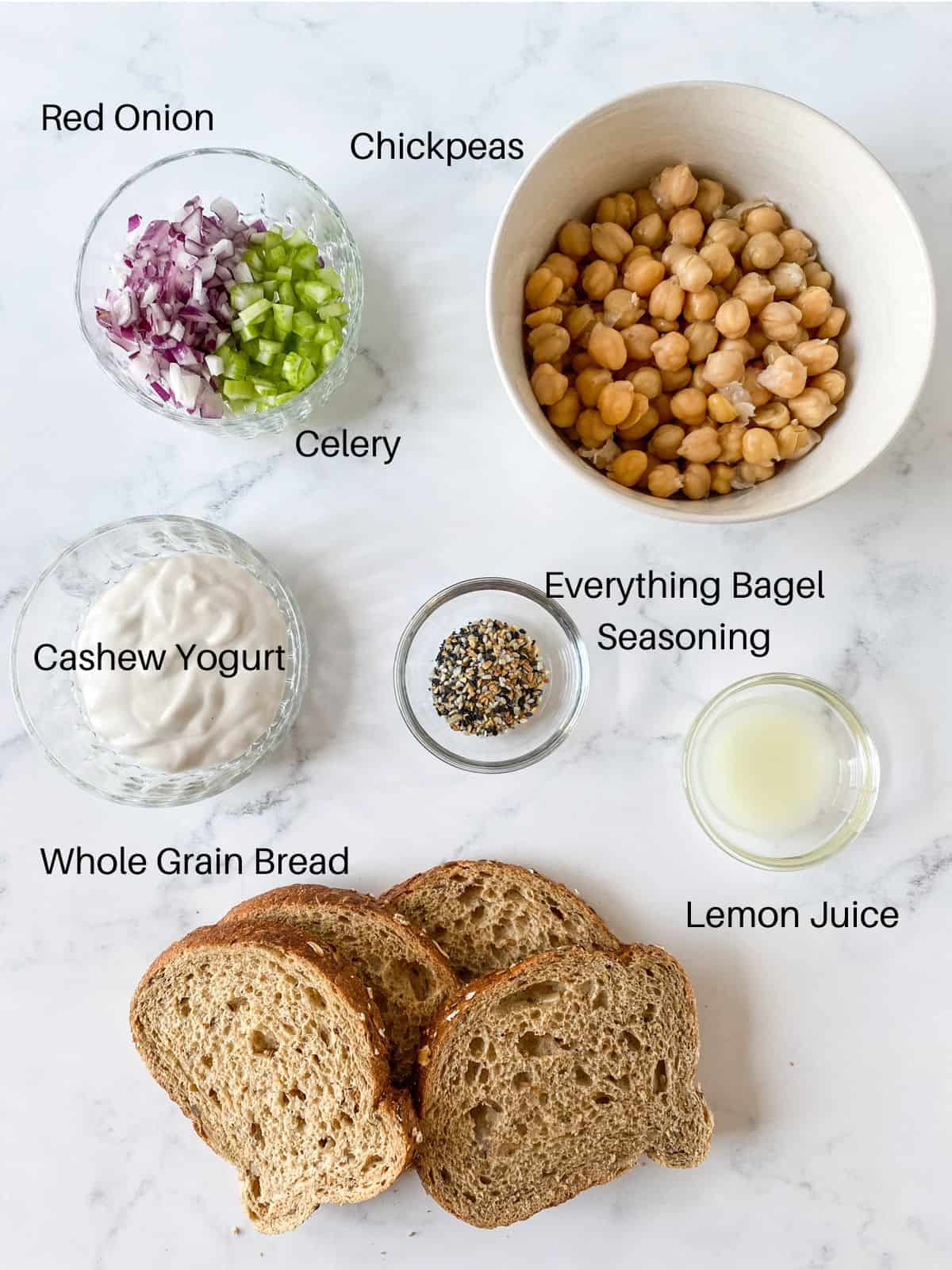 Overhead image of ingredients for mashed chickpea salad.
