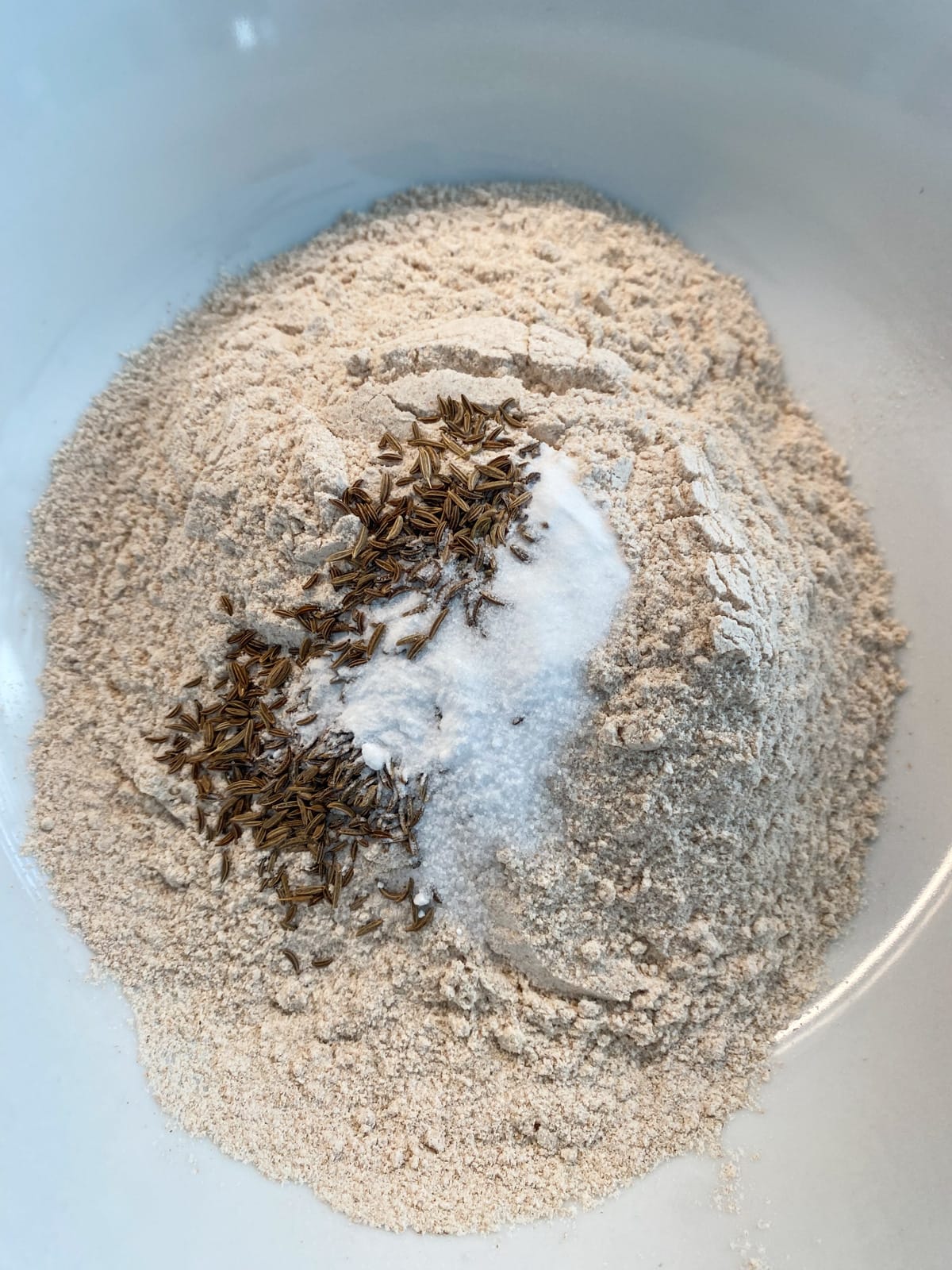 Dry dumpling ingredients in a mixing bowl.