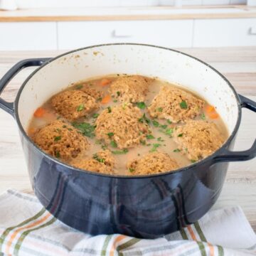 Pot of vegetable stew with soda bread dumplings.