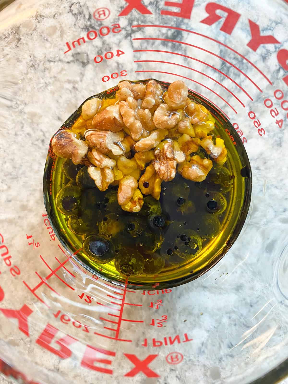 Salad dressing ingredients in a bowl.