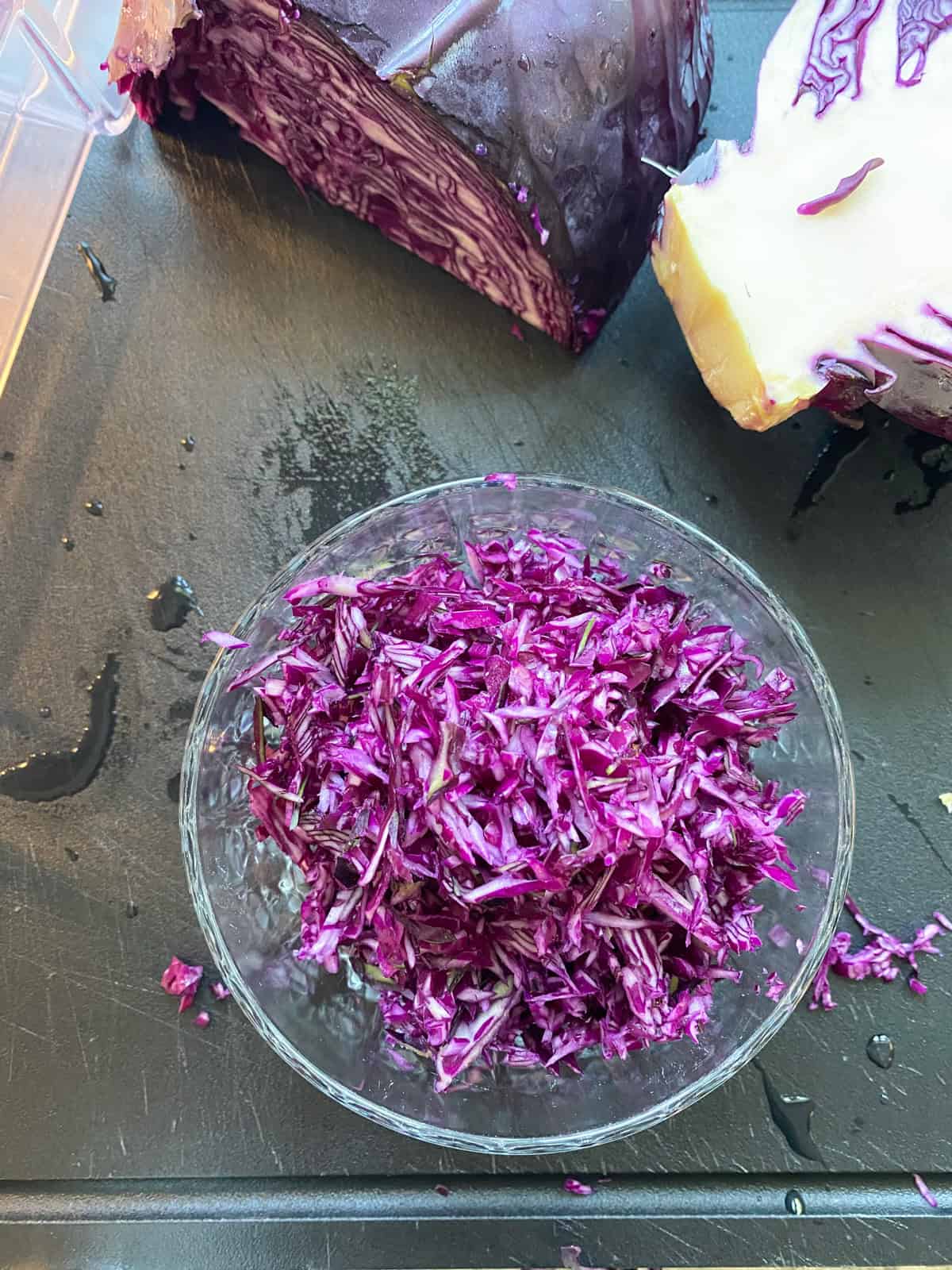 Shredded purple cabbage in a small bowl.