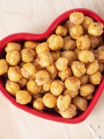 Crispy chickpeas in a heart shaped bowl.