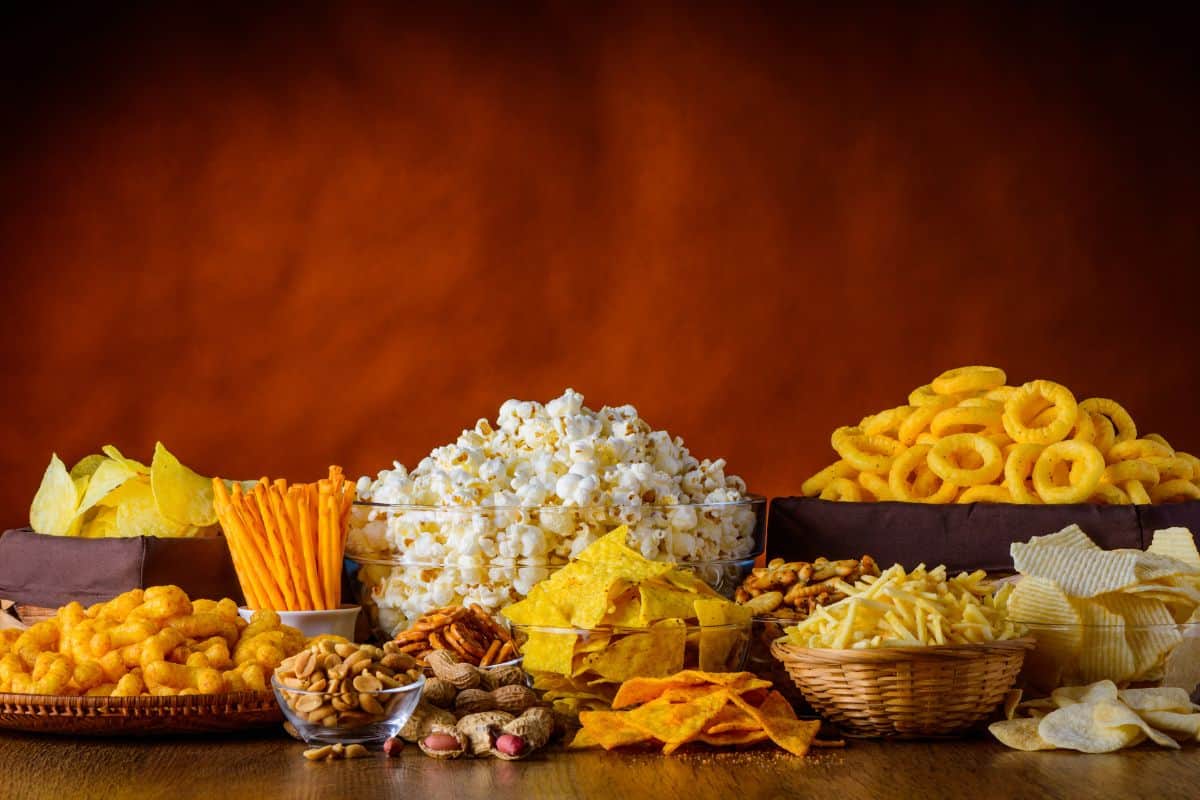 Variety of snack foods in serving bowls.