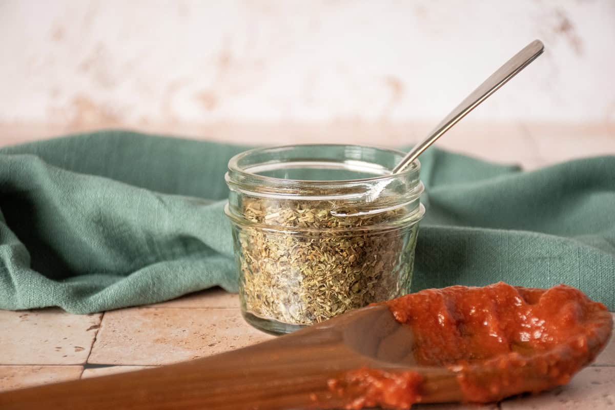 Small jar of Italian seasoning.