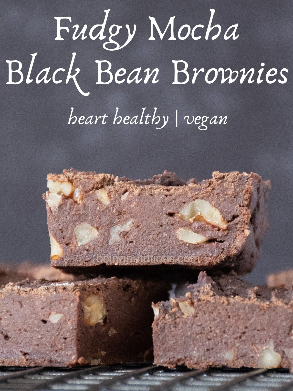 Side view of cut brownies on a cooling rack. Text overlay: Fudgy Mocha Black Bean Brownies; heart healthy, vegan.