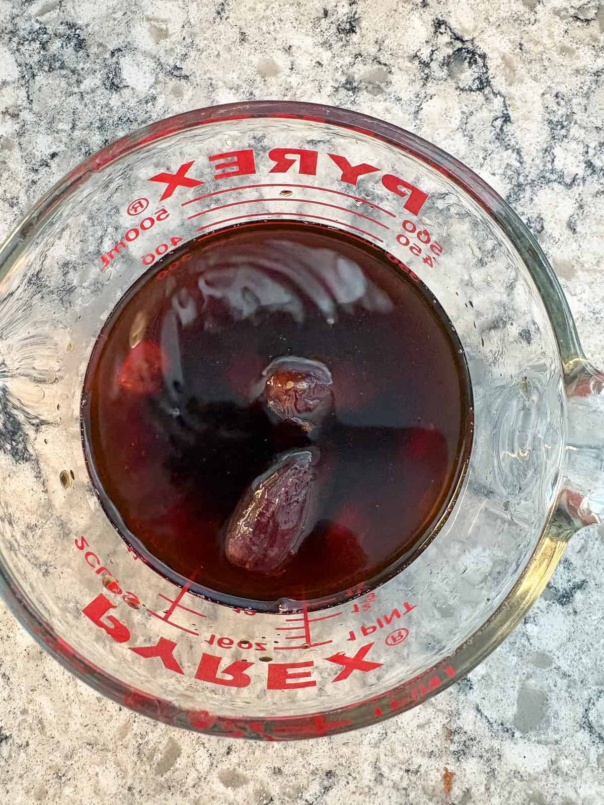 Dates soaking in coffee.