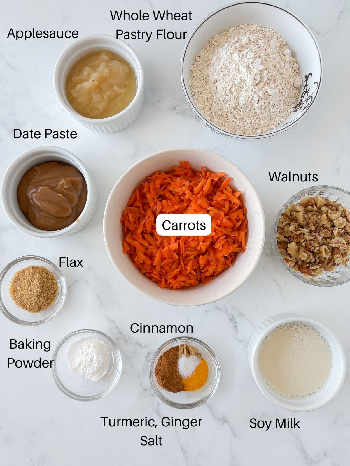 Ingredients for applesauce carrot muffins.