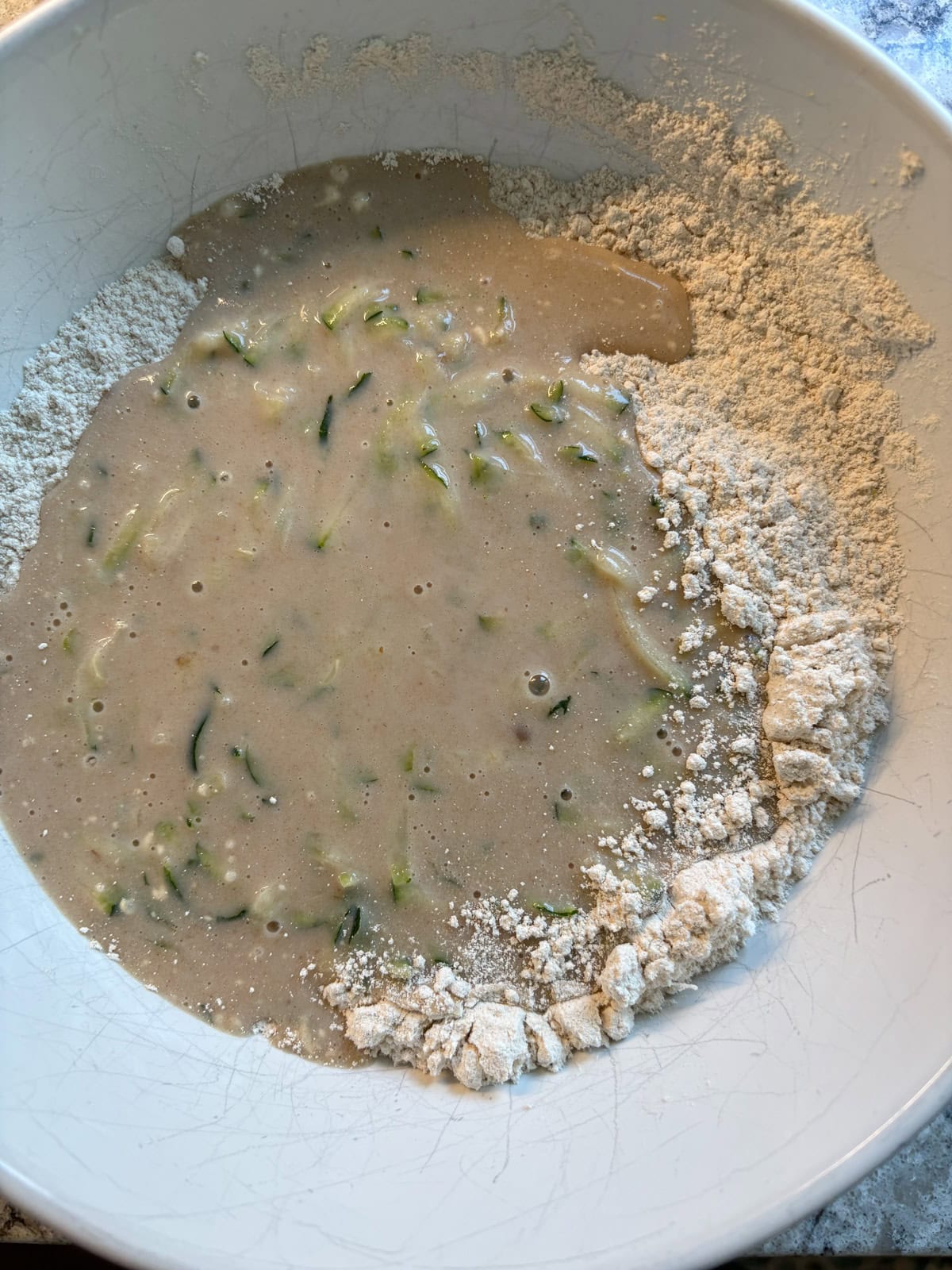 Wet ingredients poured into the dry ingredients.