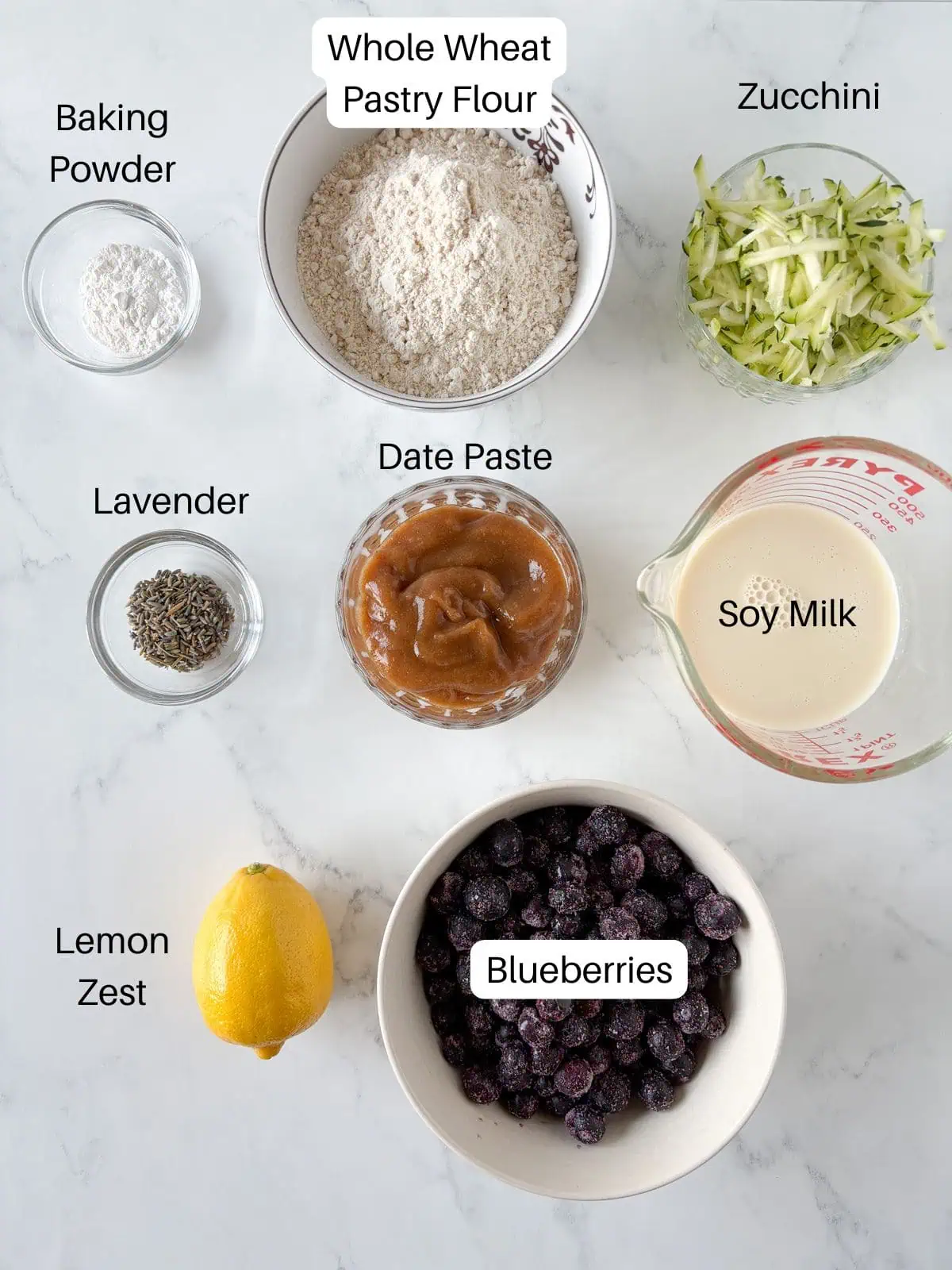 Ingredients for blueberry zucchini muffins.