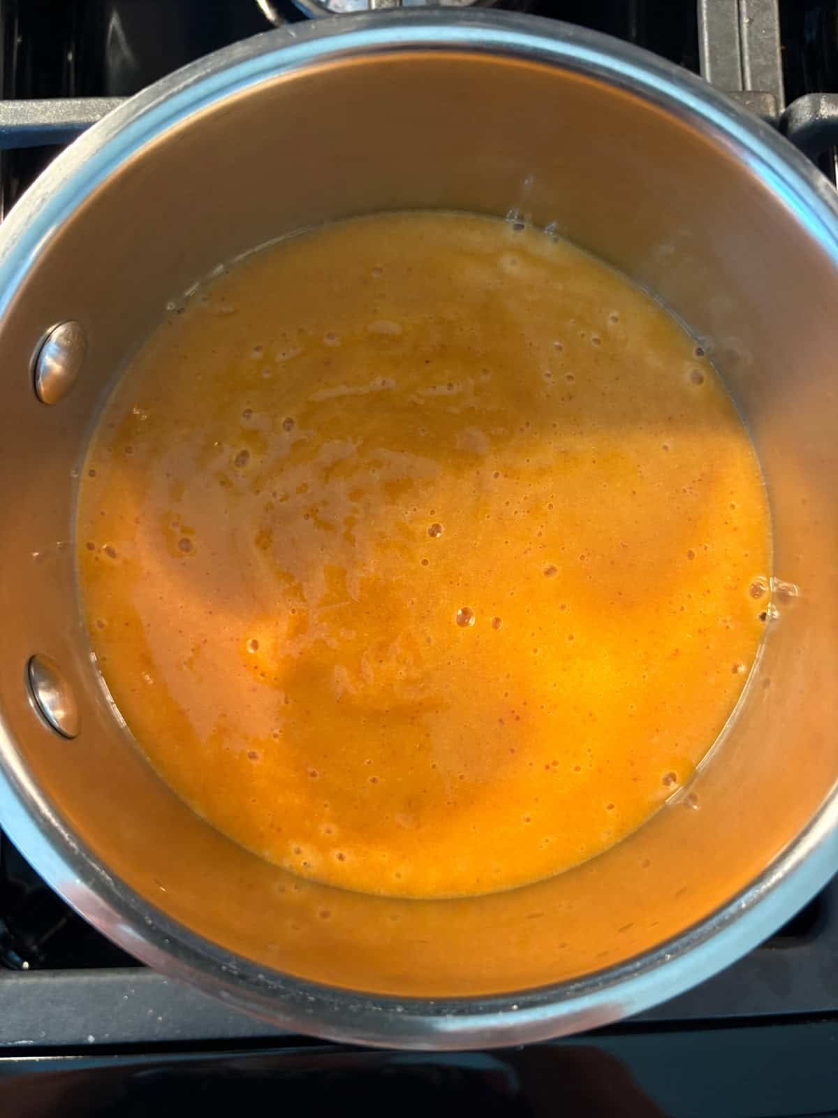 Peach puree in a pan, before simmering.