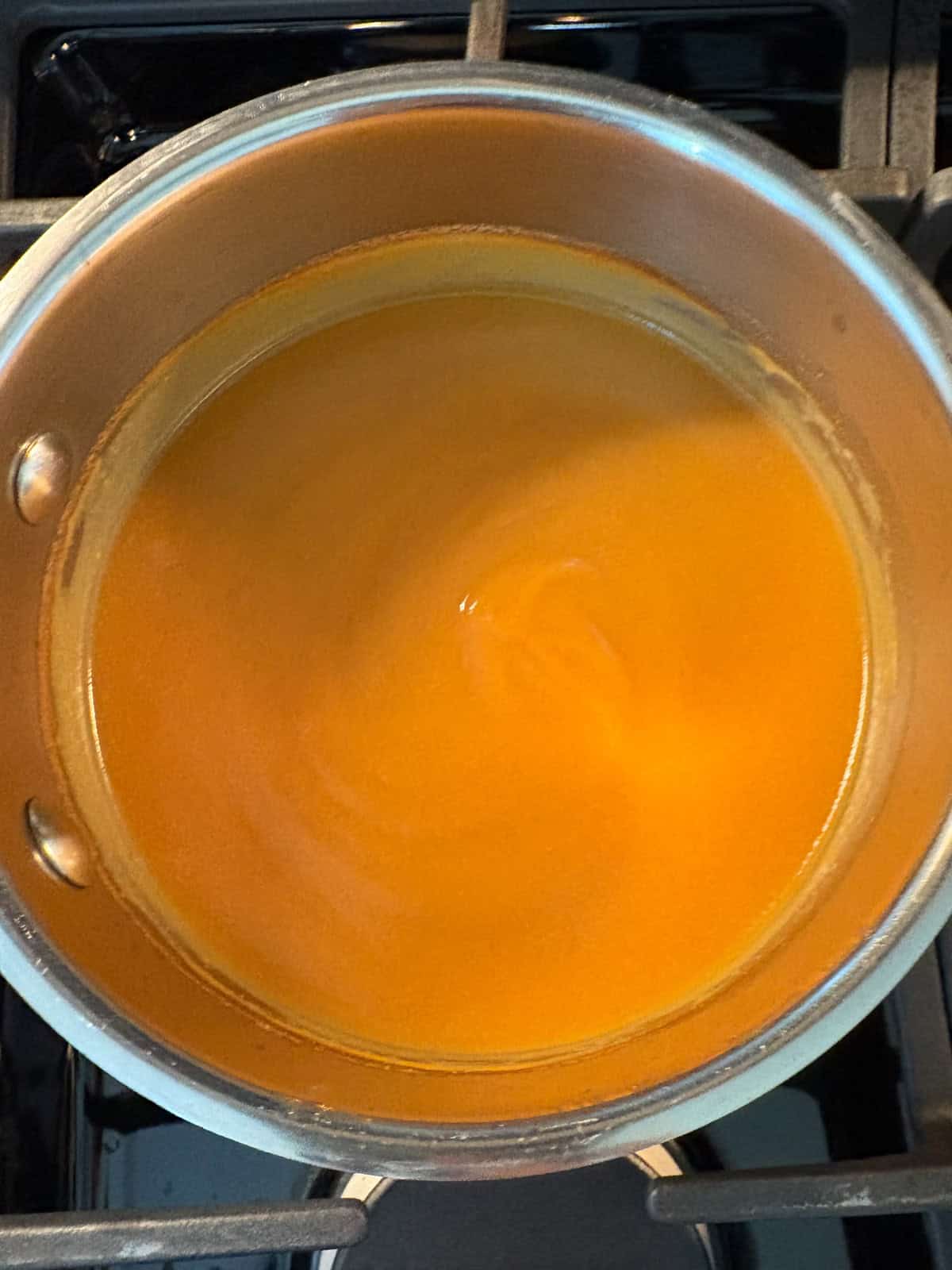 Peach syrup after simmering.