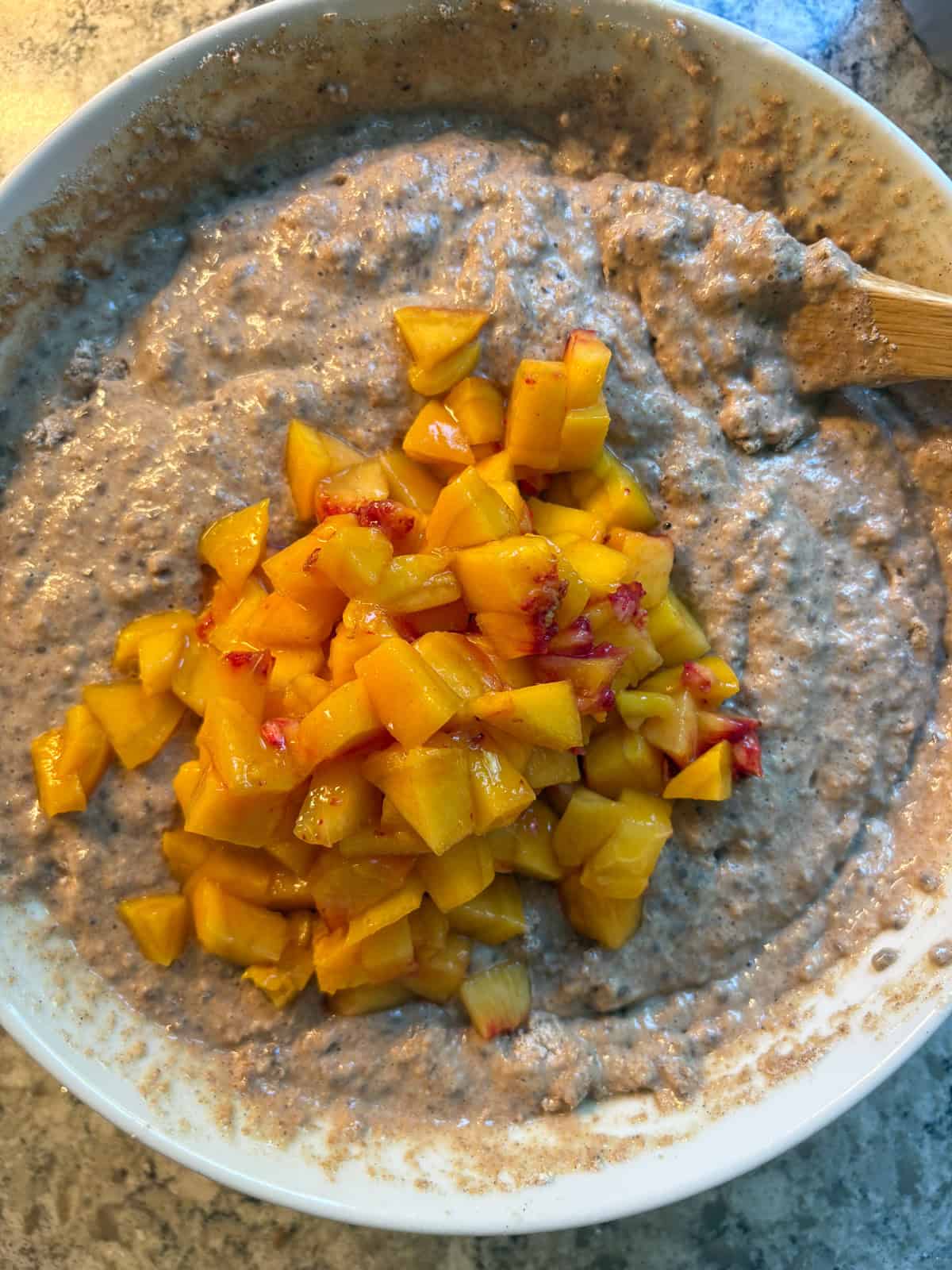 Chopped peaches added to the waffle batter.