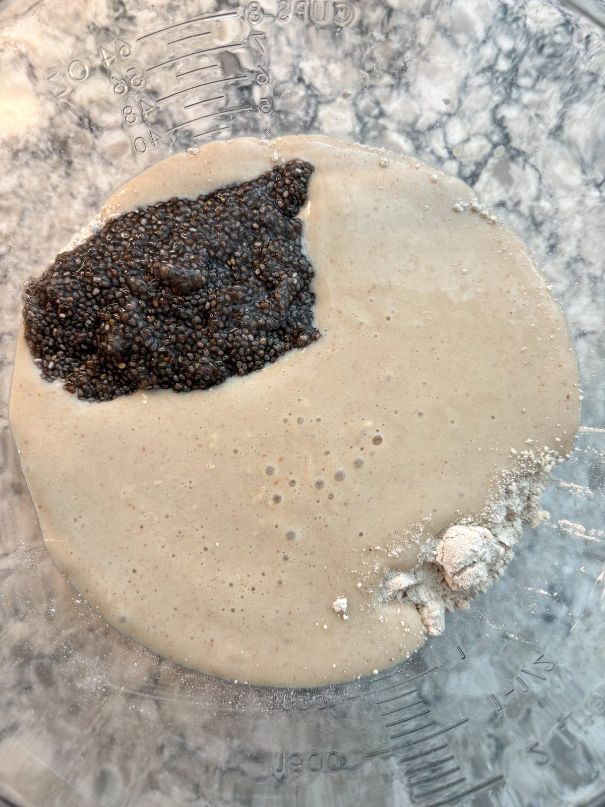 Wet ingredients poured into the dry ingredient mixture.