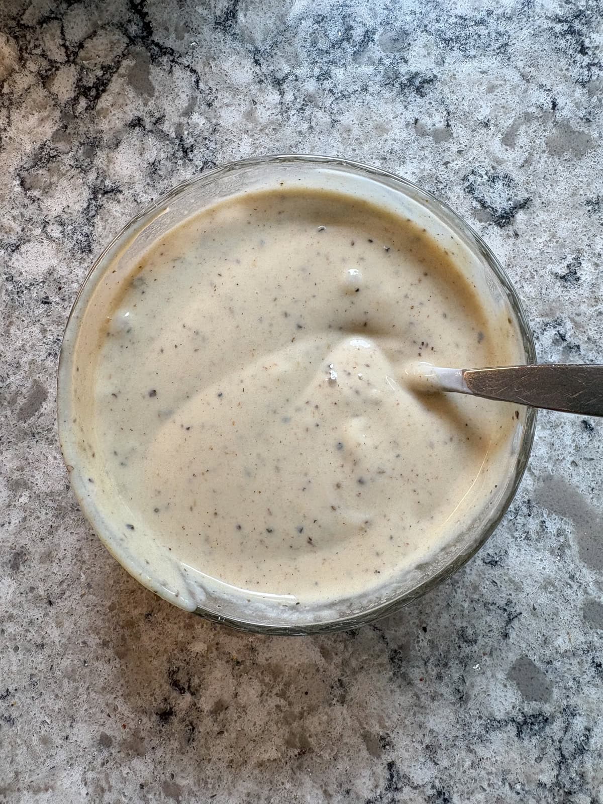 Coleslaw dressing ingredients mixed.