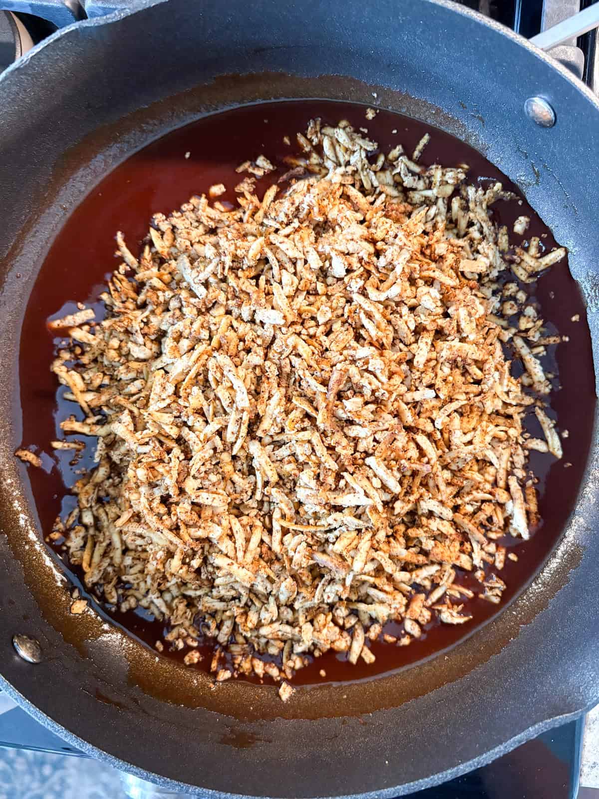 Baked tofu added to the pan.