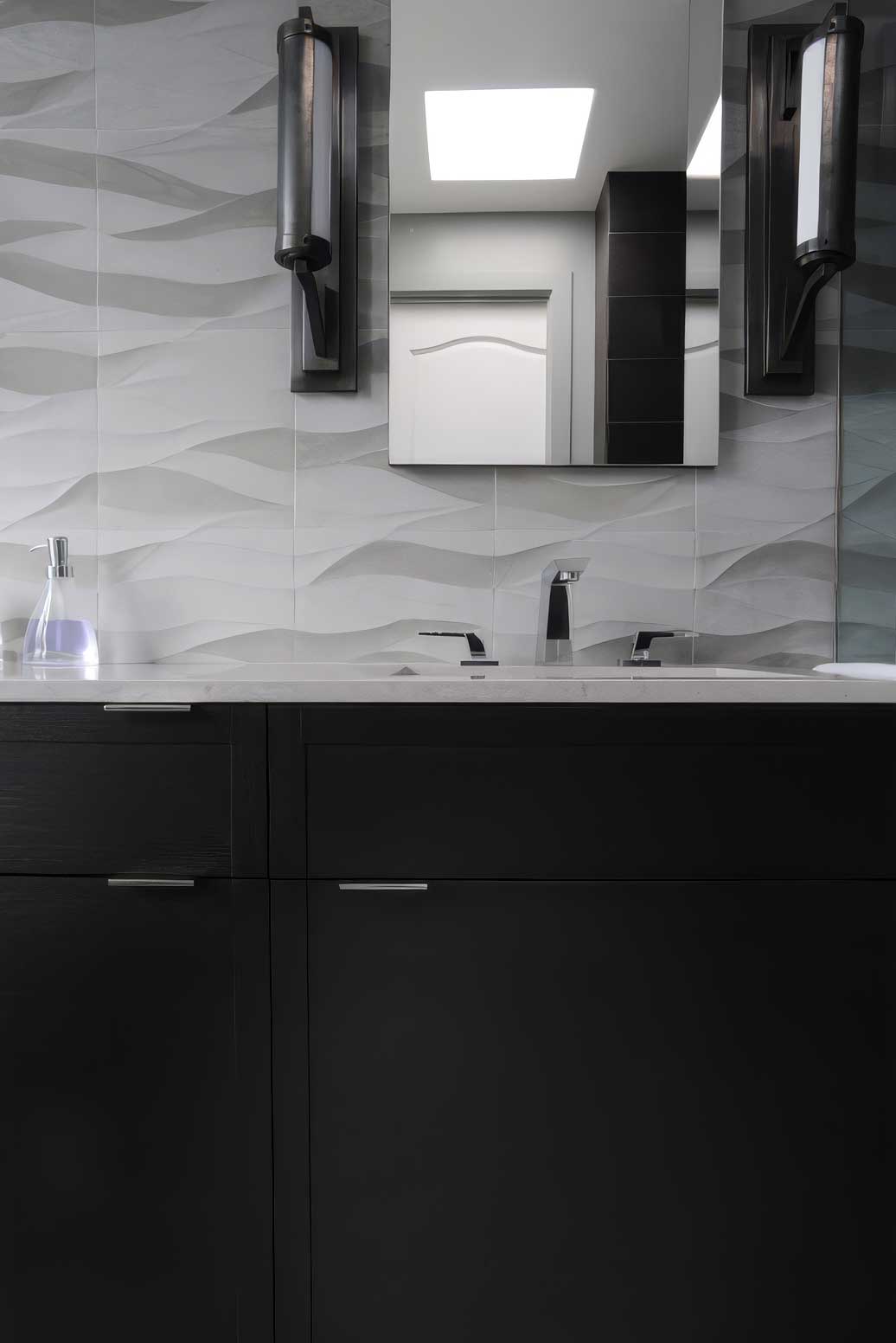 Modern bathroom with black vanity, textured wall tiles, and sleek mirror lighting.