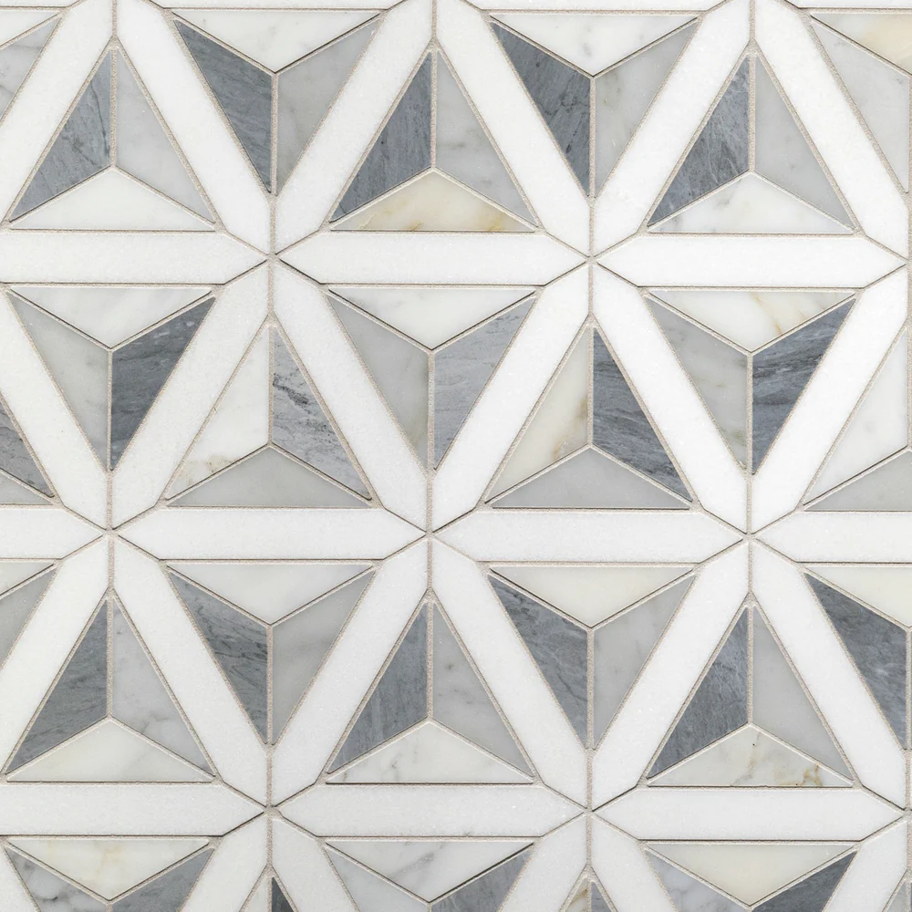 Geometric marble tile pattern with white and gray shades for interior design.