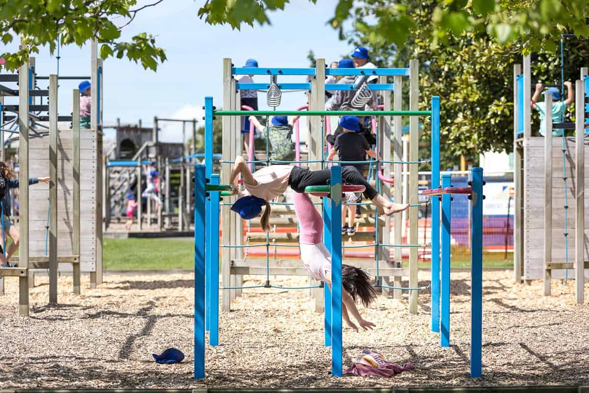 Kids playing on playground at Bell Block School in New Zealand.