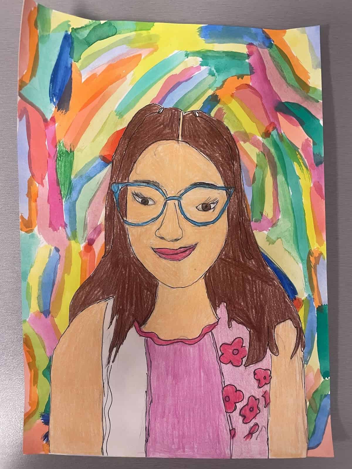 Colourful children's portrait artwork at Bell Block School, showcasing creativity and student talent.