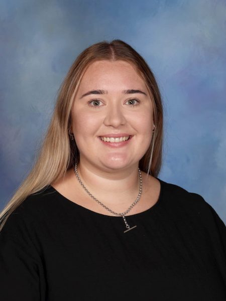 Chloe Gardner-Harrison smiling at Bell Block School, New Zealand.