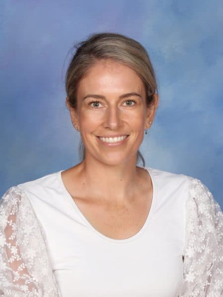 Bright smiling teacher at Bell Block School, New Zealand.