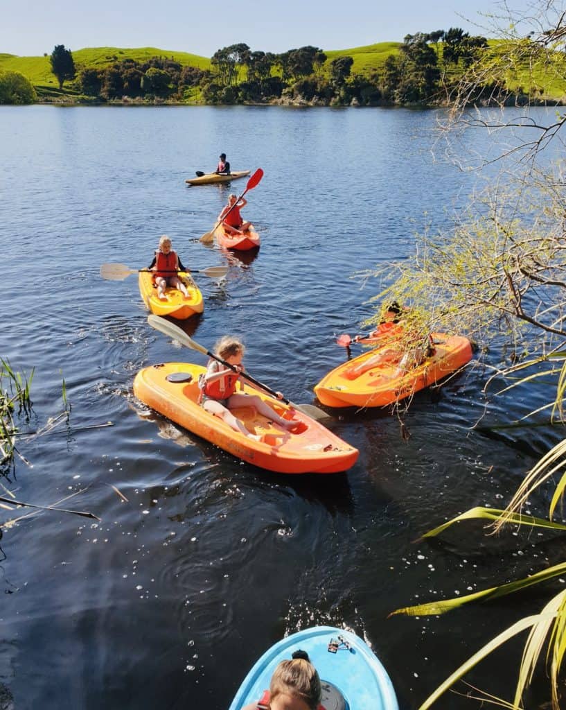 Kayaking at Bell Block School, outdoor water activities in New Zealand.