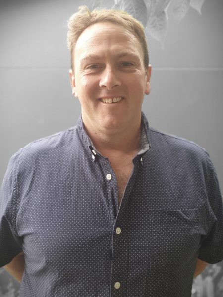 Friendly man smiling at Bell Block School, New Zealand.