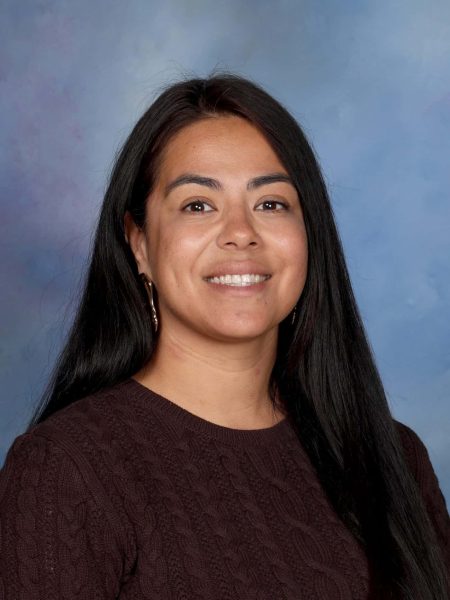 Janelle Ferries smiling portrait at Bell Block School.