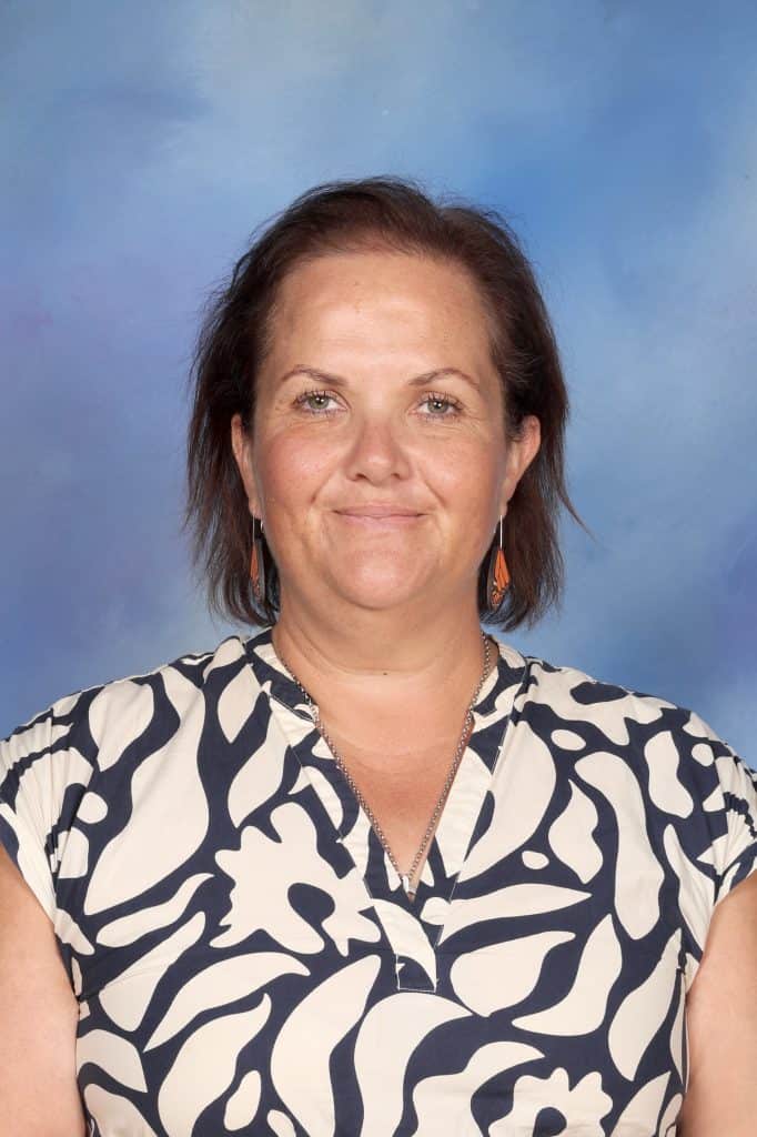 Sarah Oxenham at Bell Block School, New Zealand, smiling for a portrait.