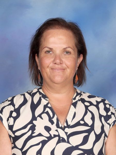 Sarah Oxenham at Bell Block School, New Zealand, smiling for a portrait.
