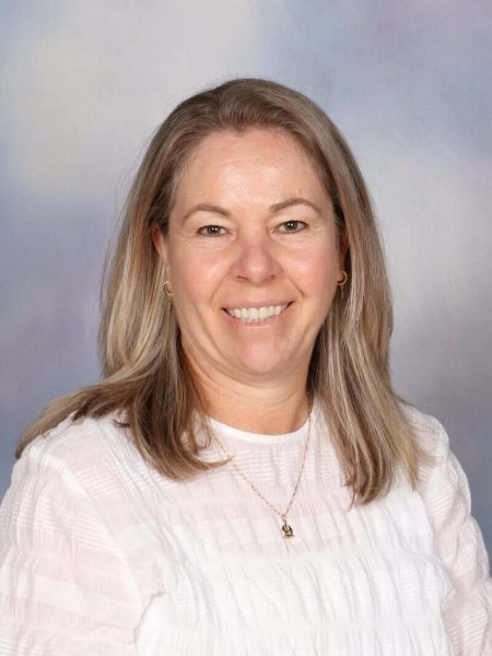Teacher smiling at Bell Block School, New Zealand school, educator portrait, professional headshot.