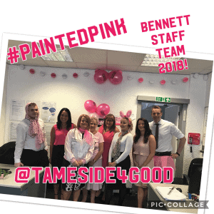 Bennett staff team in pink-themed celebration for 2018 event.