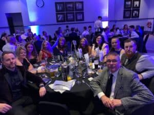 Winning team celebrating at the event.