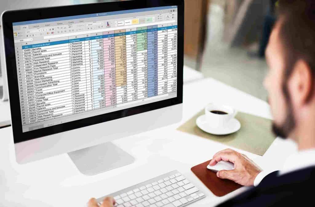 Efficient business software interface on a computer screen showing financial and project data for Indonesia's best cloud-based solutions.