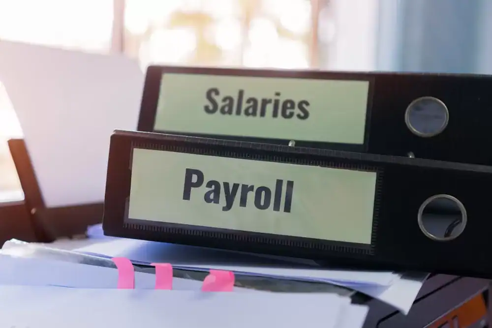 Salaries and payroll management folders labeled for efficient employee compensation processing.