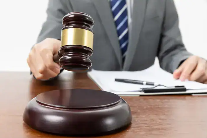Gavel and legal decision concept, representing justice and law enforcement in a professional setting.