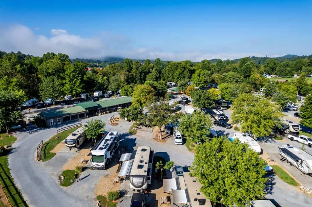 An aerial view of an rv park with lots of parked rvs.