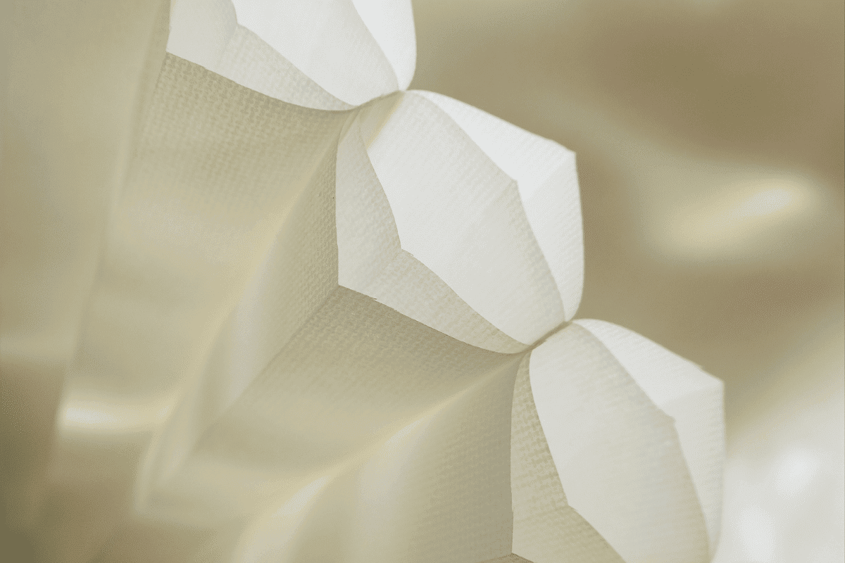 Soft white paper lanterns with textured surface for visual comfort, ideal for blind and visually impaired lighting solutions.