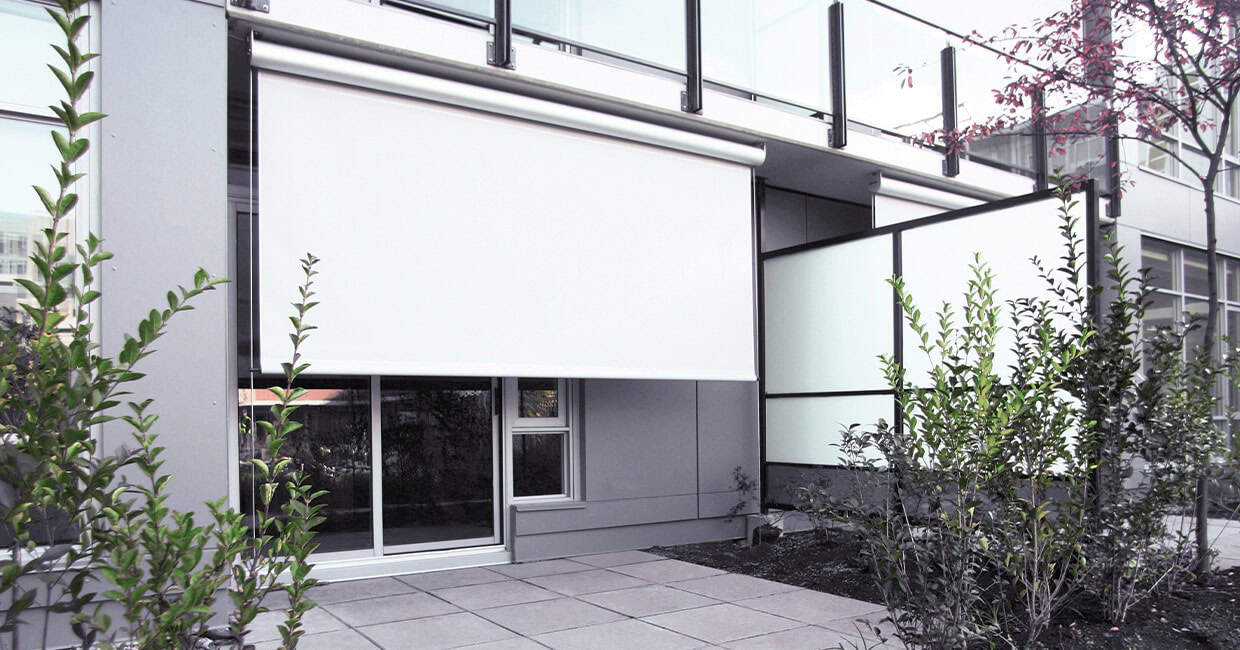 Efficient outdoor retractable shade for modern apartment balconies.