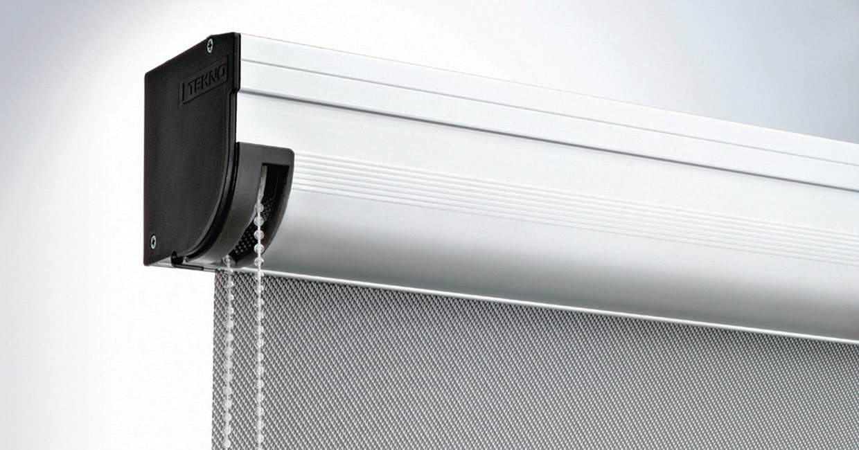 Adjustable motorized window roller blind with chain control for sleek light control.